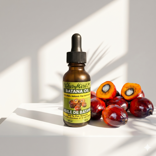 Bottle of Cher Mere Batana Oil with palm fruits on a light background