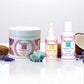 Spa product set including a jar, lotion, and tonic with decorative elements on a white background.