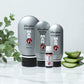 Set of skincare products for men on a white surface with a plant in the background