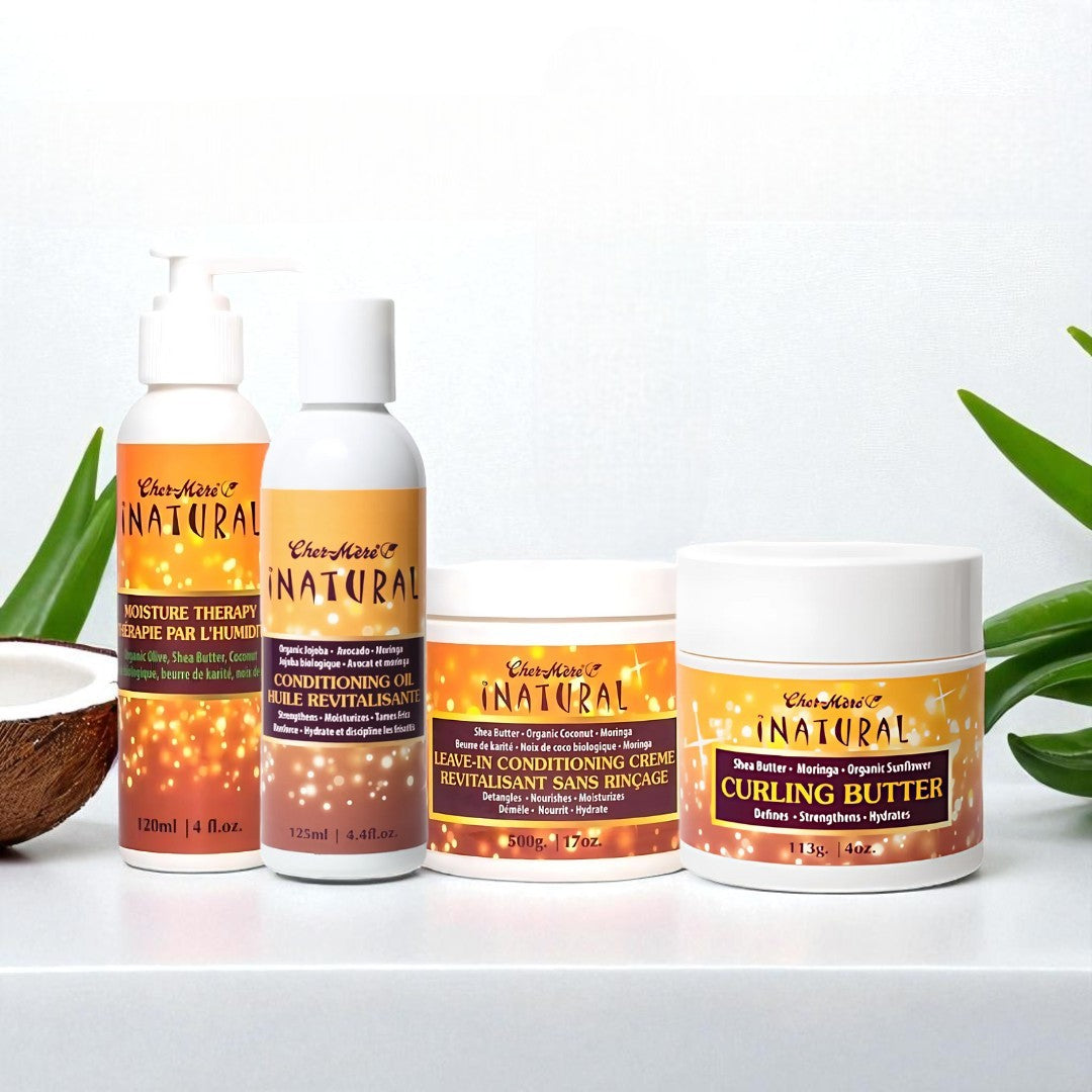 Set of Charlene's Natural hair care products on a white background with aloe vera and coconut.